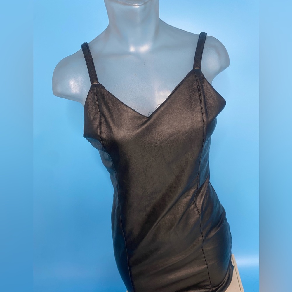 Black vegan leather dress. Thin strap with a little wear